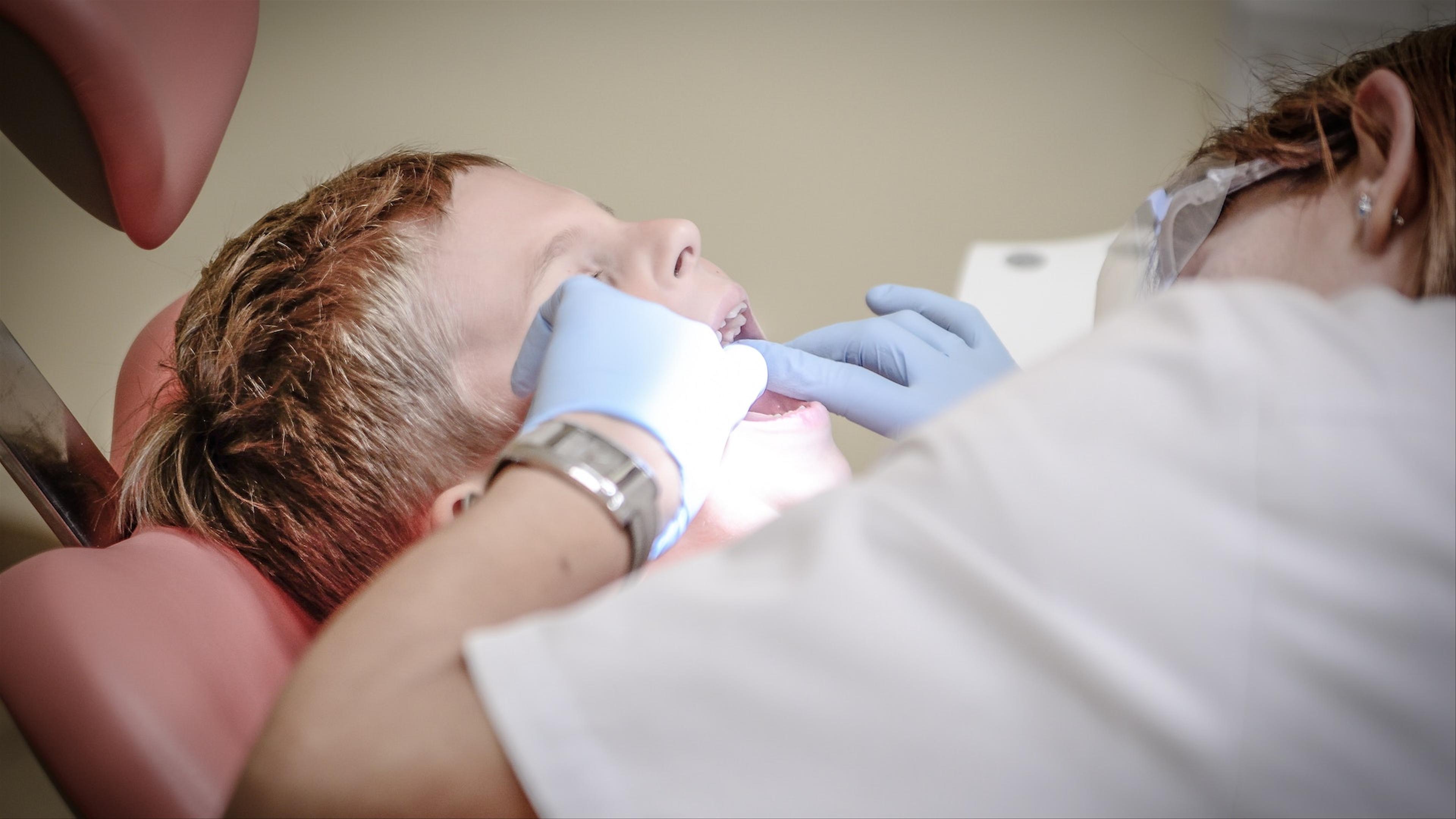 Child receiving dental care at Klinik Pergigian T3